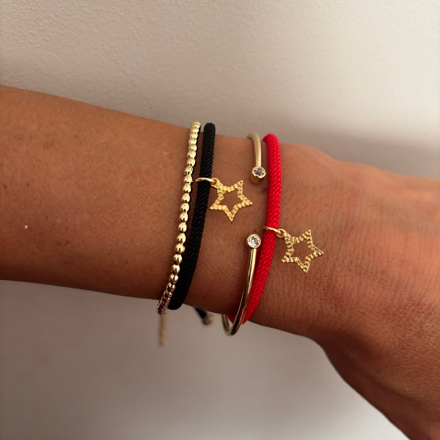 PULSERA COLORS ESTRELLA - BAÑADO EN ORO