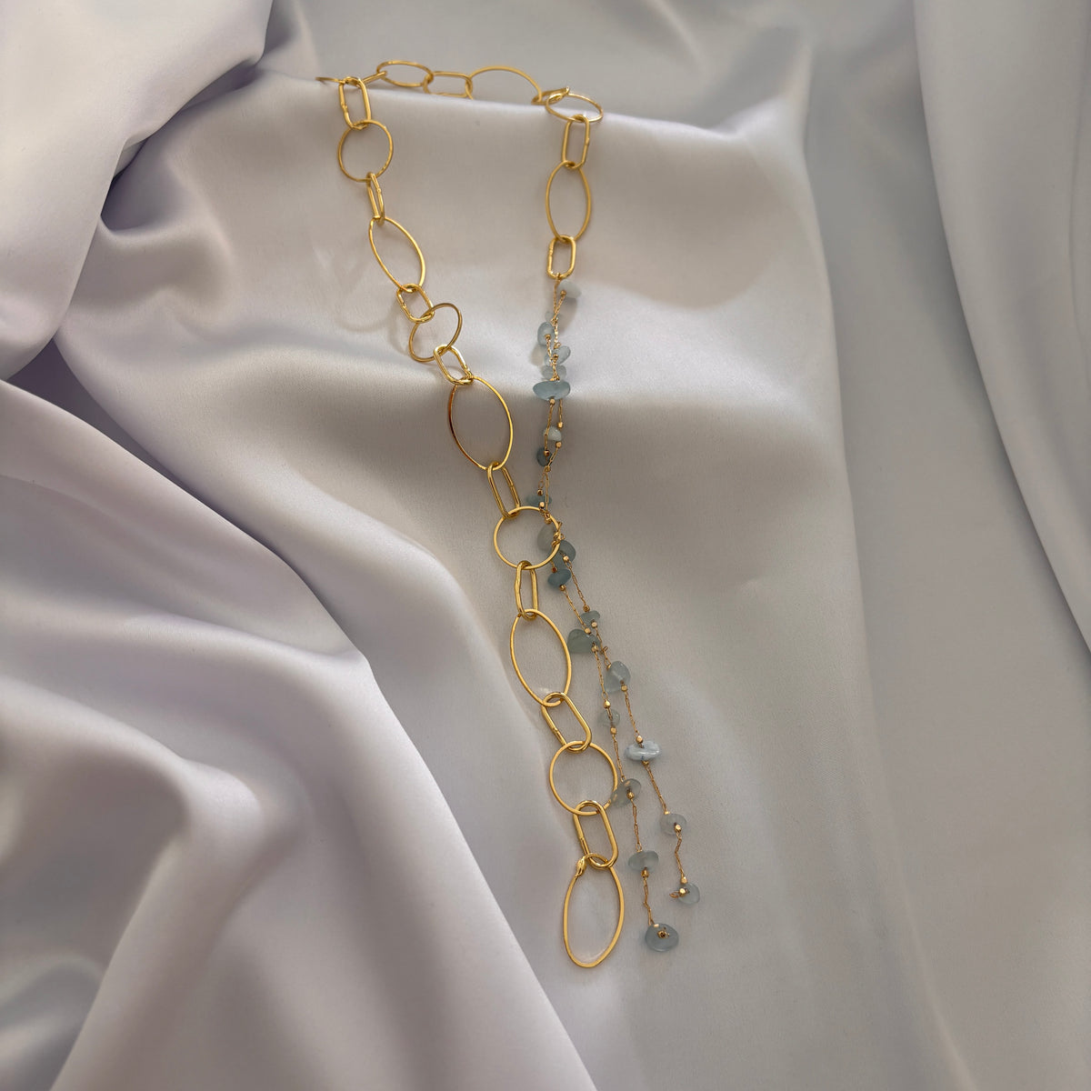 COLLAR CELESTE - BAÑADO EN ORO