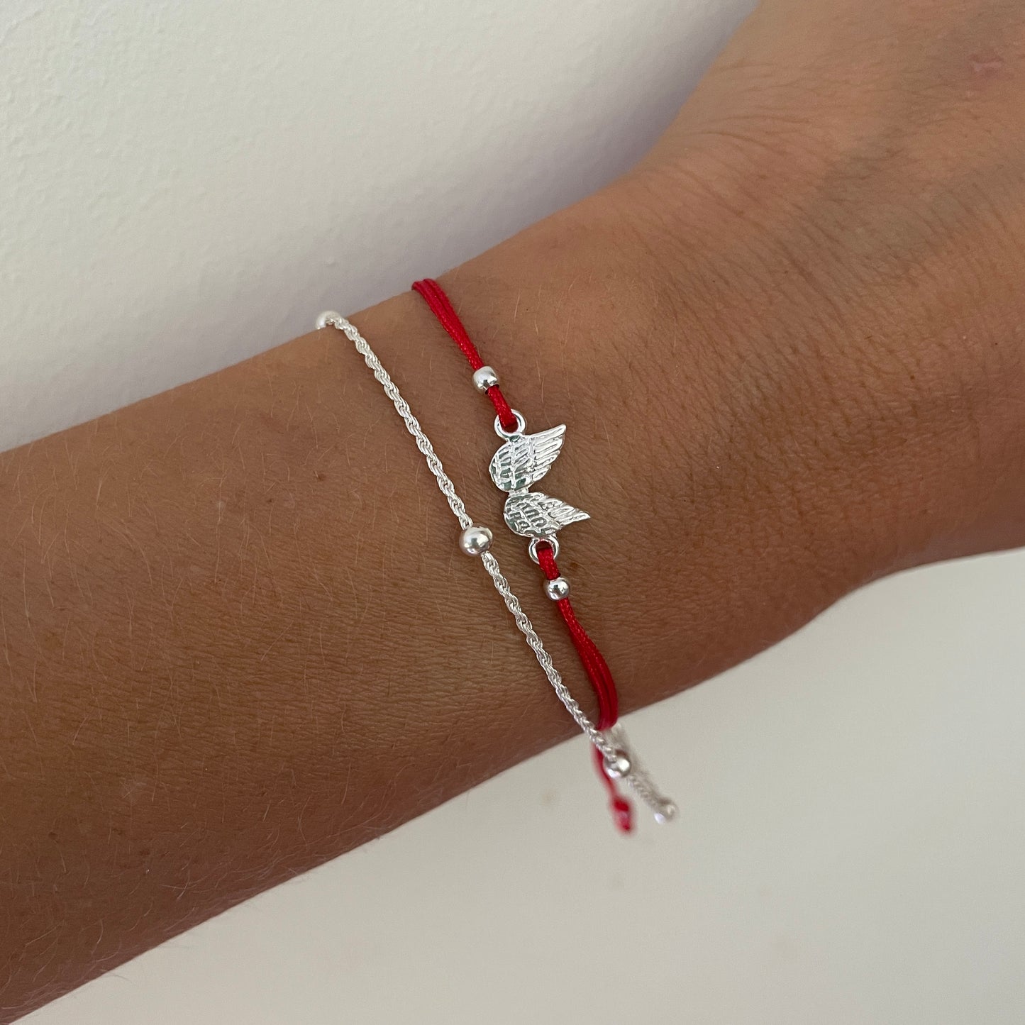 PULSERA HILO ALAS DE ÁNGEL  - PLATA