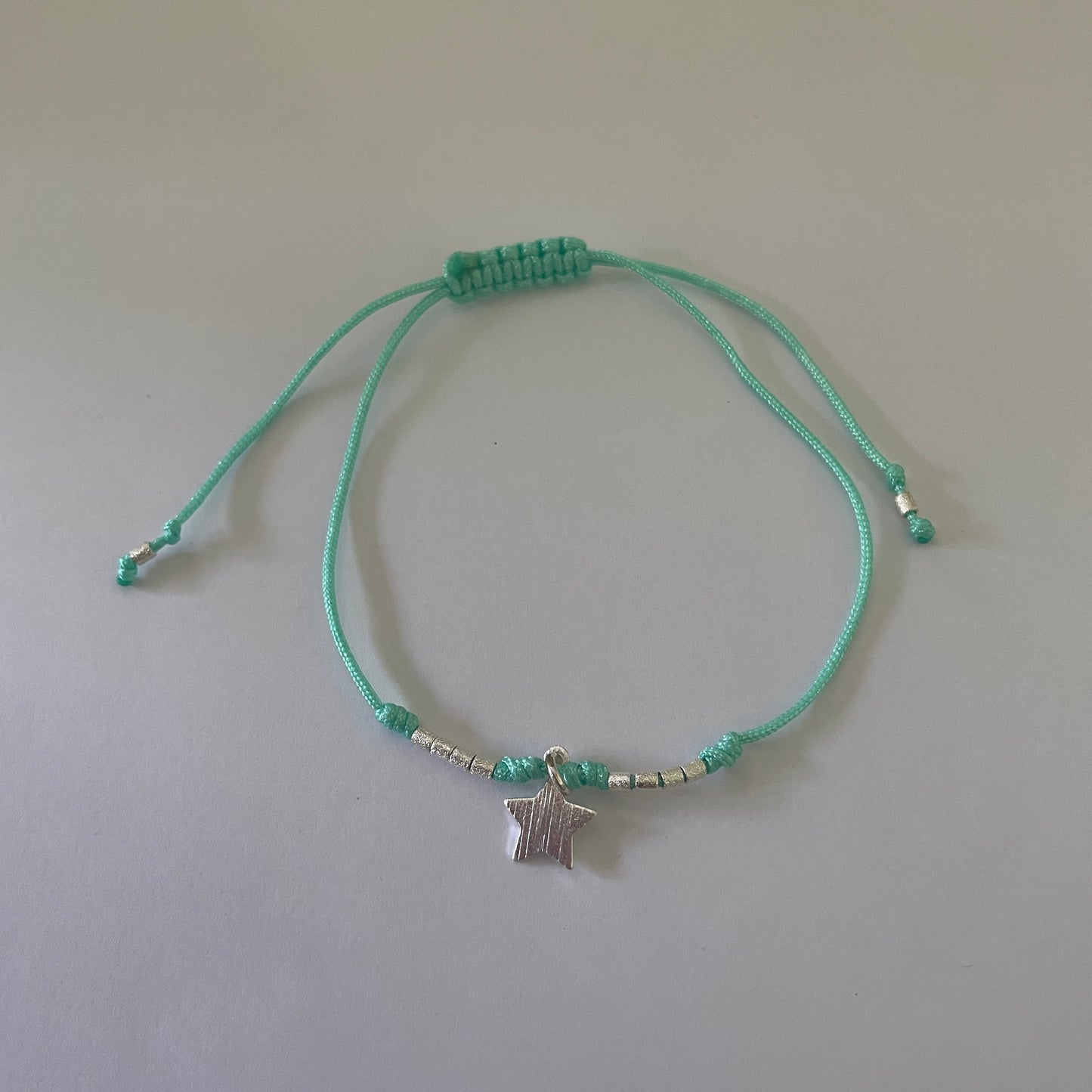 PULSERA HILO STAR  - BAÑADO EN PLATA